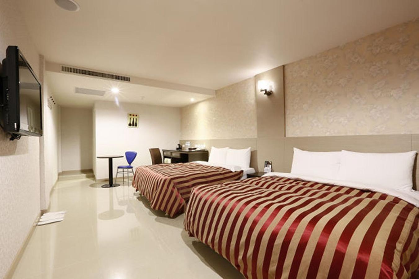 Hua Xiang Motel - Arena Гаосюн Екстер'єр фото