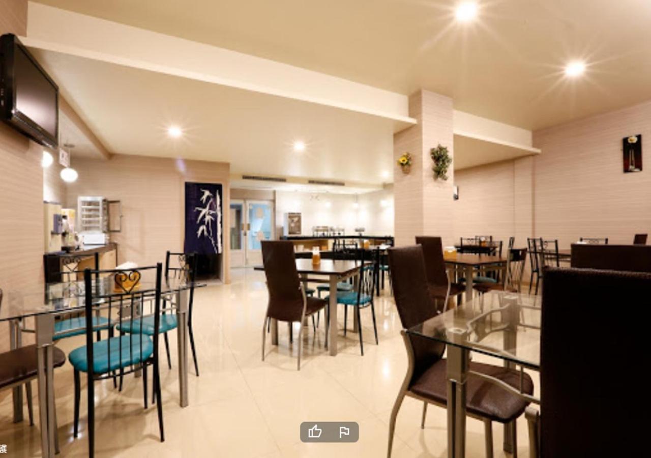 Hua Xiang Motel - Arena Гаосюн Екстер'єр фото