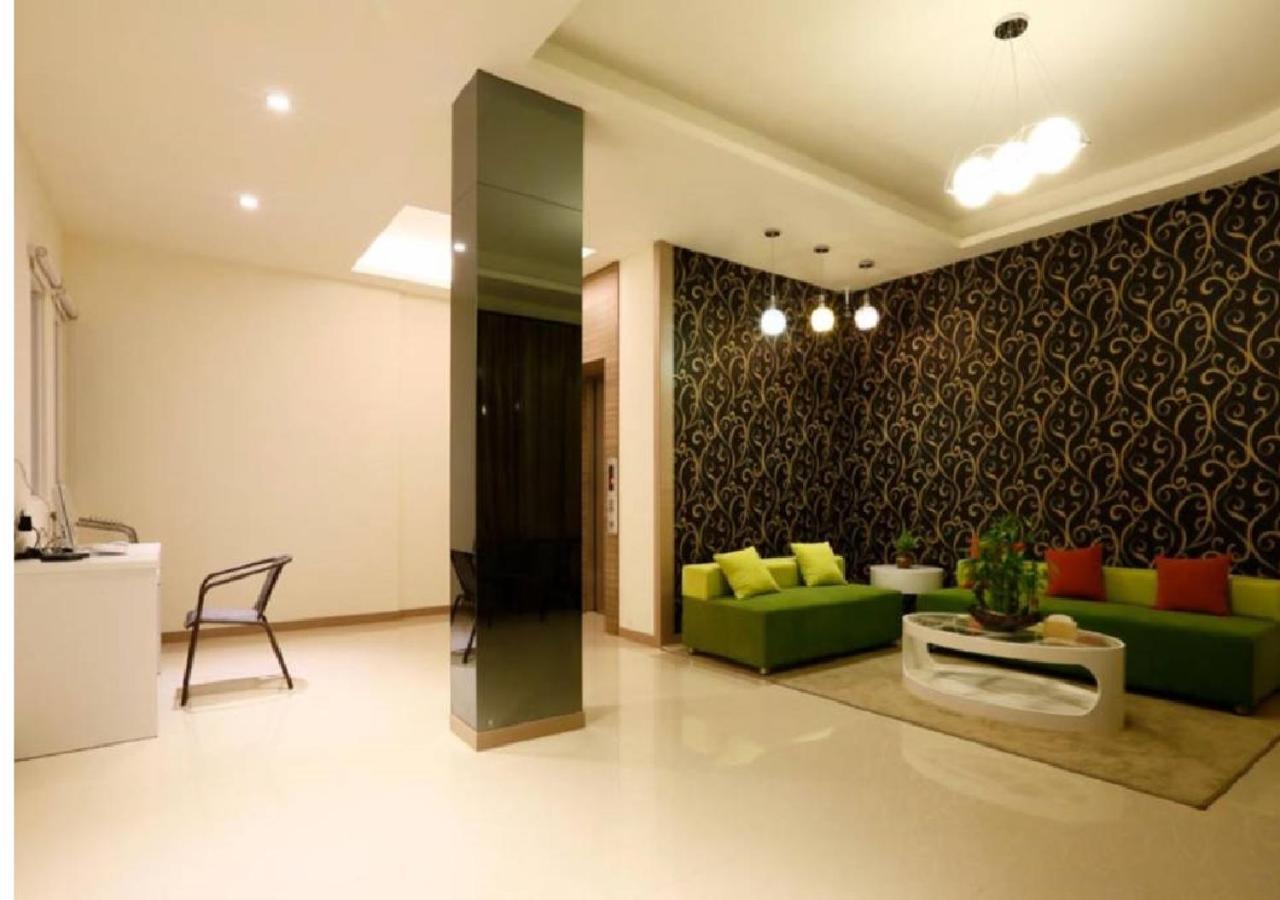 Hua Xiang Motel - Arena Гаосюн Екстер'єр фото