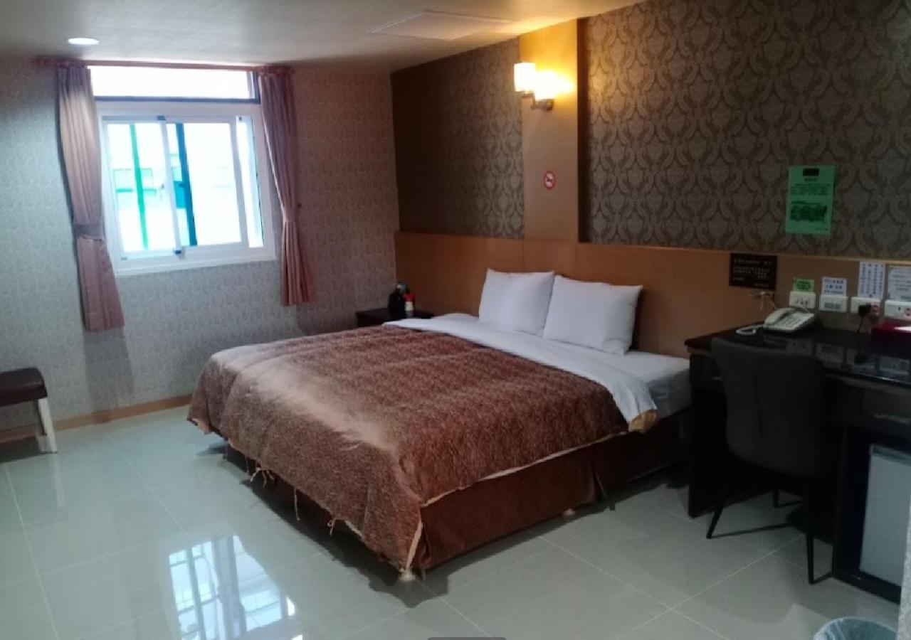 Hua Xiang Motel - Arena Гаосюн Екстер'єр фото