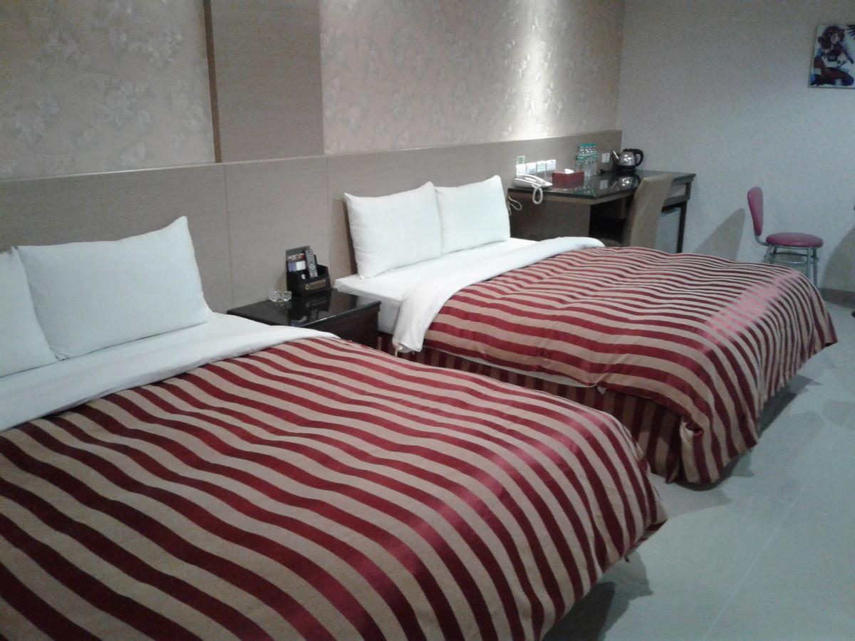 Hua Xiang Motel - Arena Гаосюн Екстер'єр фото